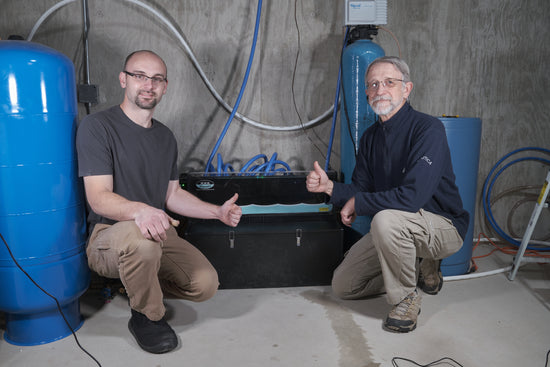 a HUG Hydronics in-floor heating system is installed easily by contractors or home owners. These two are giving it a thumbs up. Easy to install, easy to maintain, Easy as HUG Hydronics in floor heating radiant 