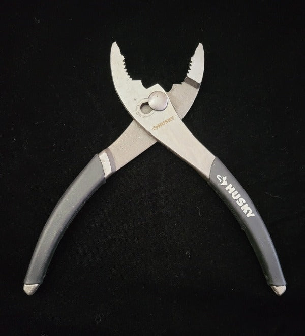 A slip jaw pliers is part of the HUG Hydronics in-floor heating system installation tool kit