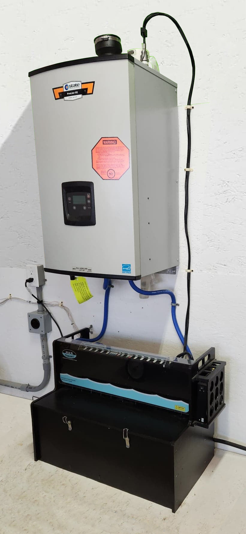 the state proline combi boiler can heat your floors and hot water at the same time, This picture shows it hooked up with the HUG hydronics in floor heating system with the adaptor